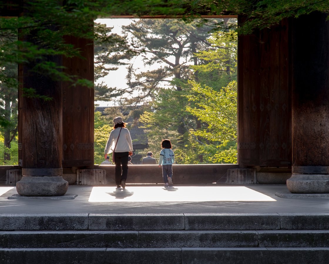 Woman and son walking