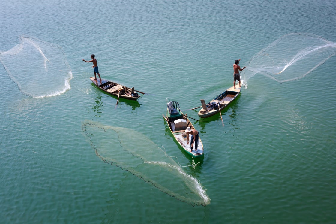 men-in-fishing-boats