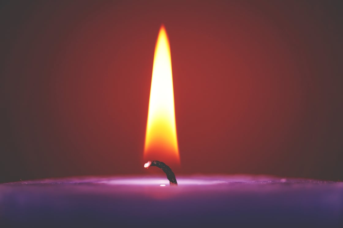 flame on a purple candle