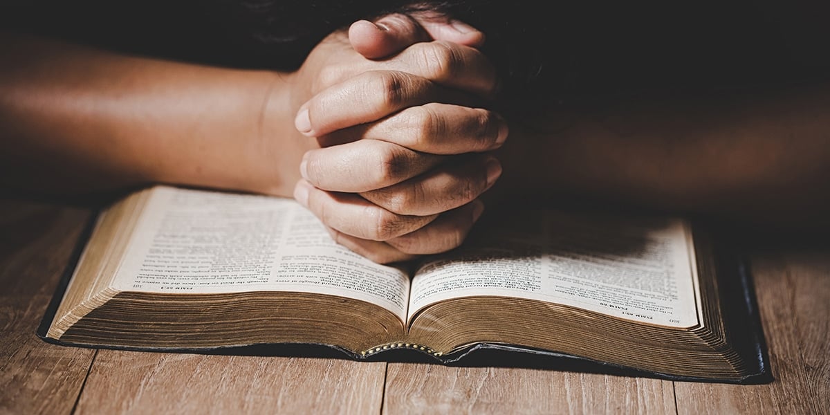 hands-prayer-bible