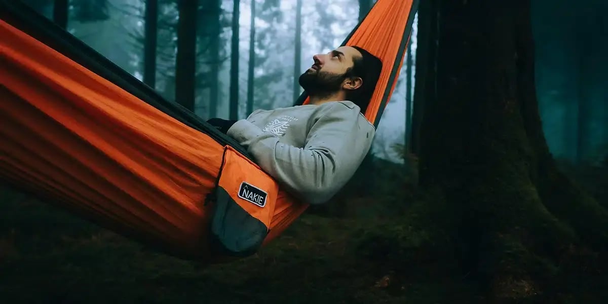 man_hammock_forest