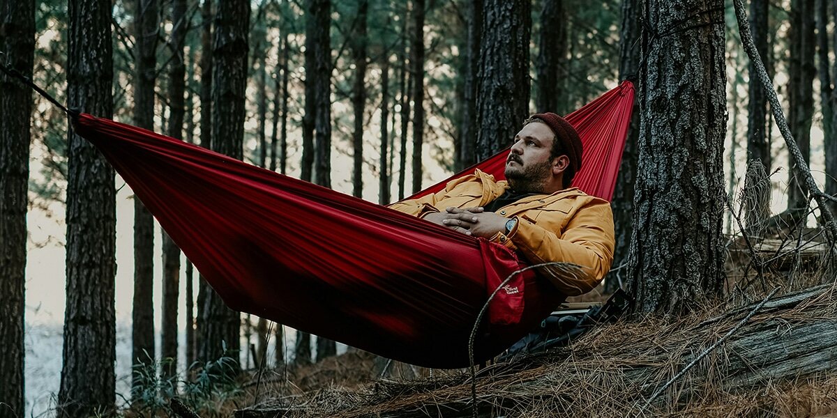 man_hammock_reflecting