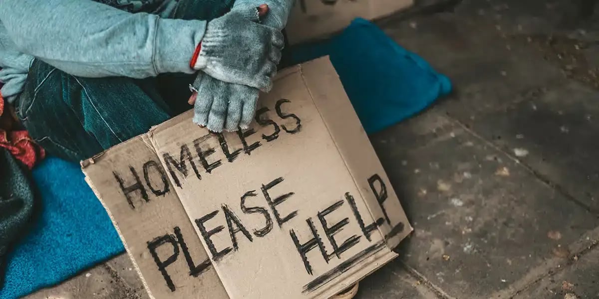 man_homeless_sign