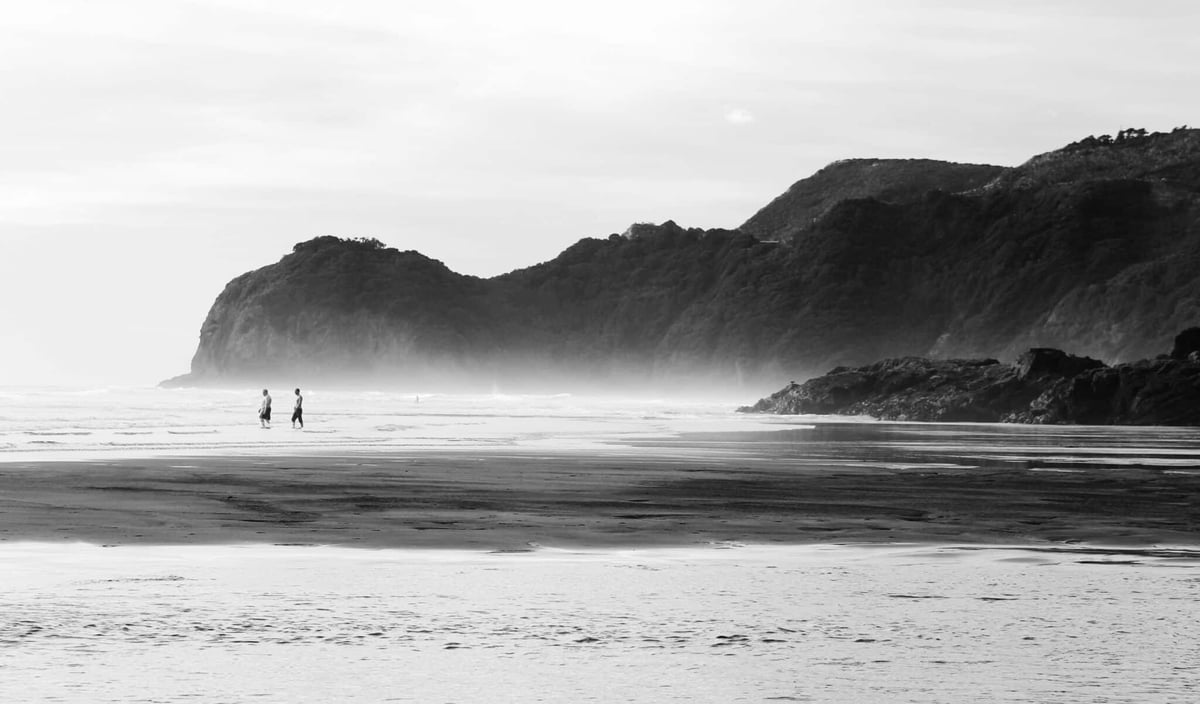 two-people-at-a-beach-photo-by-vinit-vispute-unsplash-scaled-1