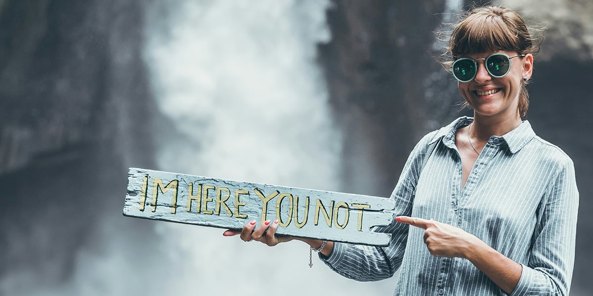 woman-sign-waterfall