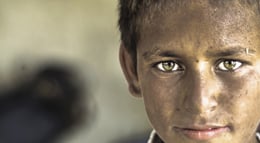 young-afghan-boy-looks-at-the-camera