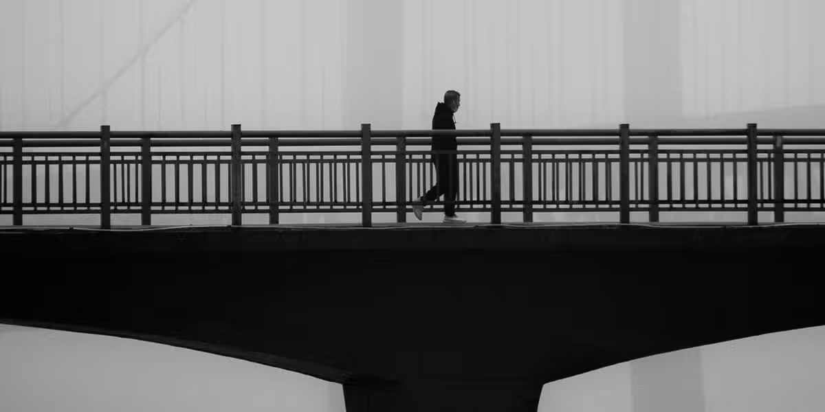 man_bridge_walking