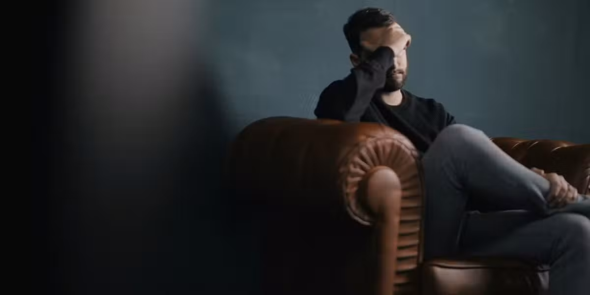 man_couch_stress
