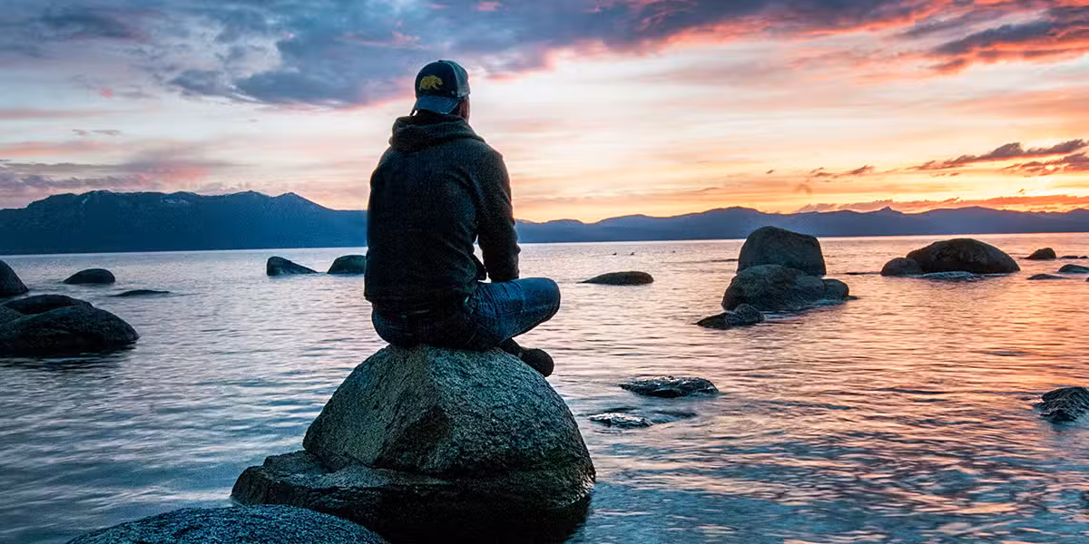 man_rock_sunset