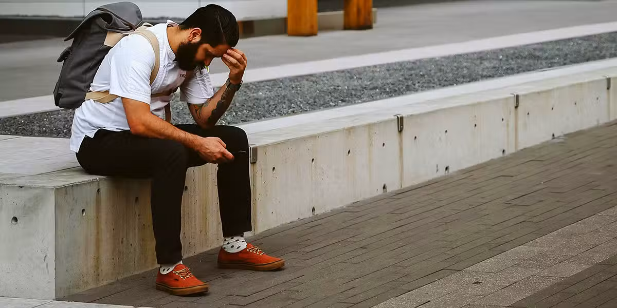 man_sad_sitting