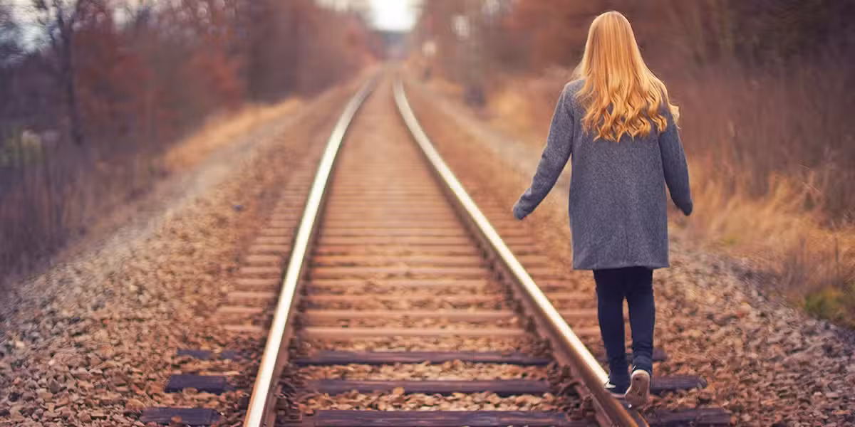 woman_balancing_traintracks