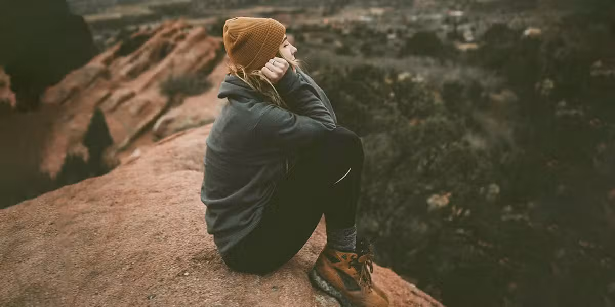 woman_sitting_rocks-1